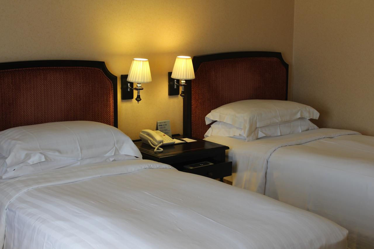 Hotel Kingdom Kaohsiung Rum bild